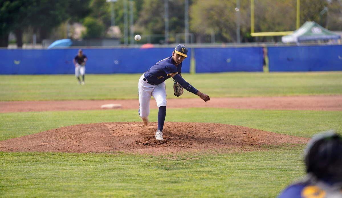 Gregori pitcher Dominic Hernandez delivers a pitch in a CCAL game against Downey High at Downey High School in Modesto, Calif. on Wednesday, April 16, 2025.