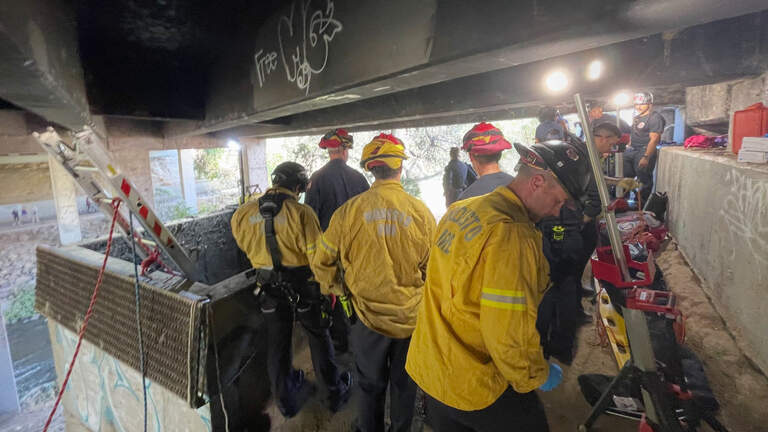 How firefighters rescued person trapped in storm drain under Dry Creek bridge in Modesto