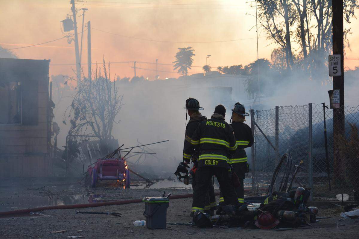 A fire at a mobile home park on South Seventh Street in Modesto on Wednesday night, May 25, 2022, drew a three-alarm response and burned five homes, displacing 17 people.