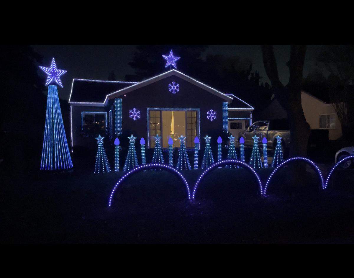 A house on 1236 Sycamore Ave in Modesto features 15,000 color changing RGB lights synchronized to music.