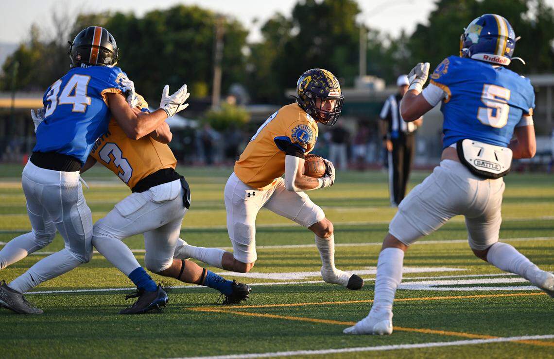 South runner Vincent Lopez (Orestimba) carries the ball after a catch in the Central California Lions All-Star Football Game at Tracy High School in Tracy, Calif., Saturday, June 24, 2023.
