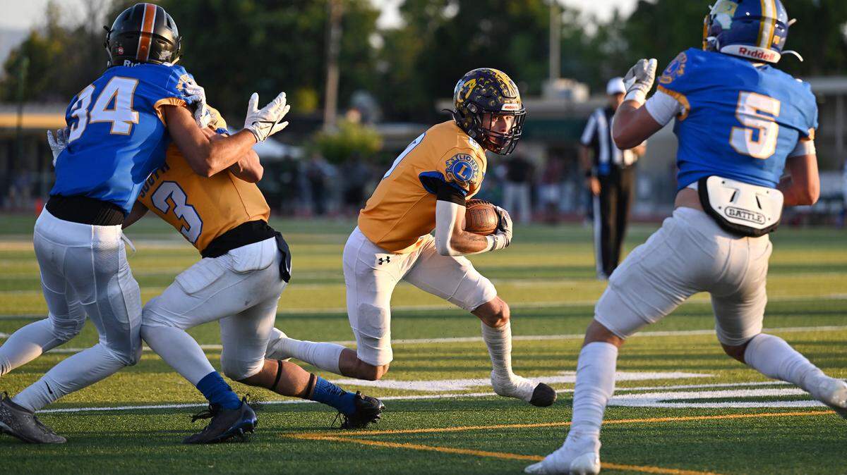 South runner Vincent Lopez (Orestimba) carries the ball after a catch in the Central California Lions All-Star Football Game at Tracy High School in Tracy, Calif., Saturday, June 24, 2023.