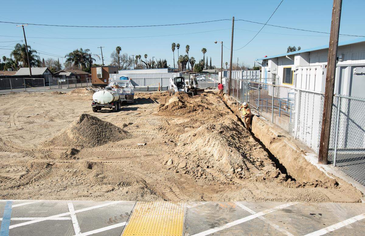 Workers begin the foundation of the future STEM building at Tuolumne Elementary School in Modesto, Calif., on Thursday, Feb.17, 2022.