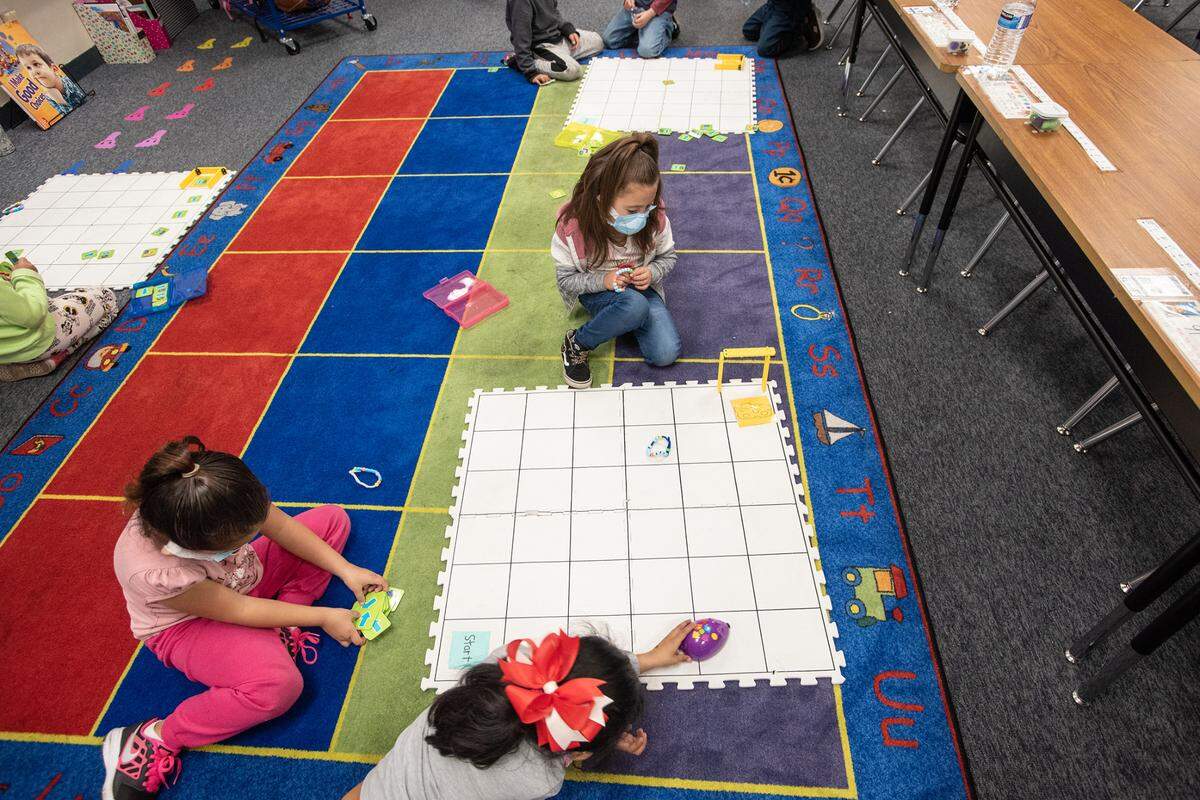 Kindergarten students work with basic coding principals during class at Tuolumne Elementary School in Modesto, Calif., on Thursday, Feb.17, 2022.