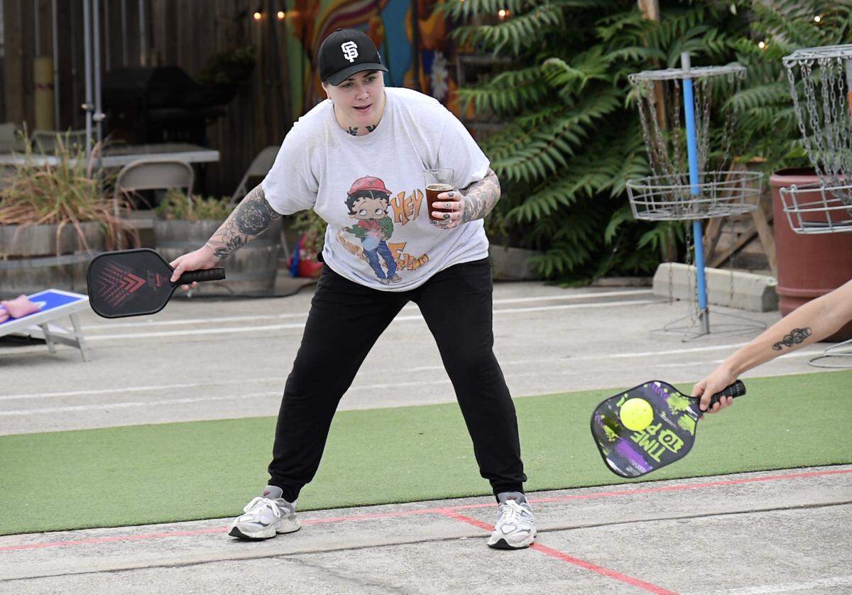 Kayla Just plays a game of pickleball at Contentment Brewery in Modesto on Wednesday, Oct. 22, 2025.  