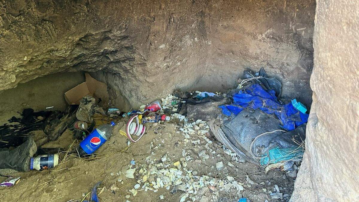 Two people suffered burns Sunday afternoon, Sept. 24, 2023, when they used gasoline to start a fire in a cave cut into the bank along the Tuolumne River at Crater Avenue in south Modesto.