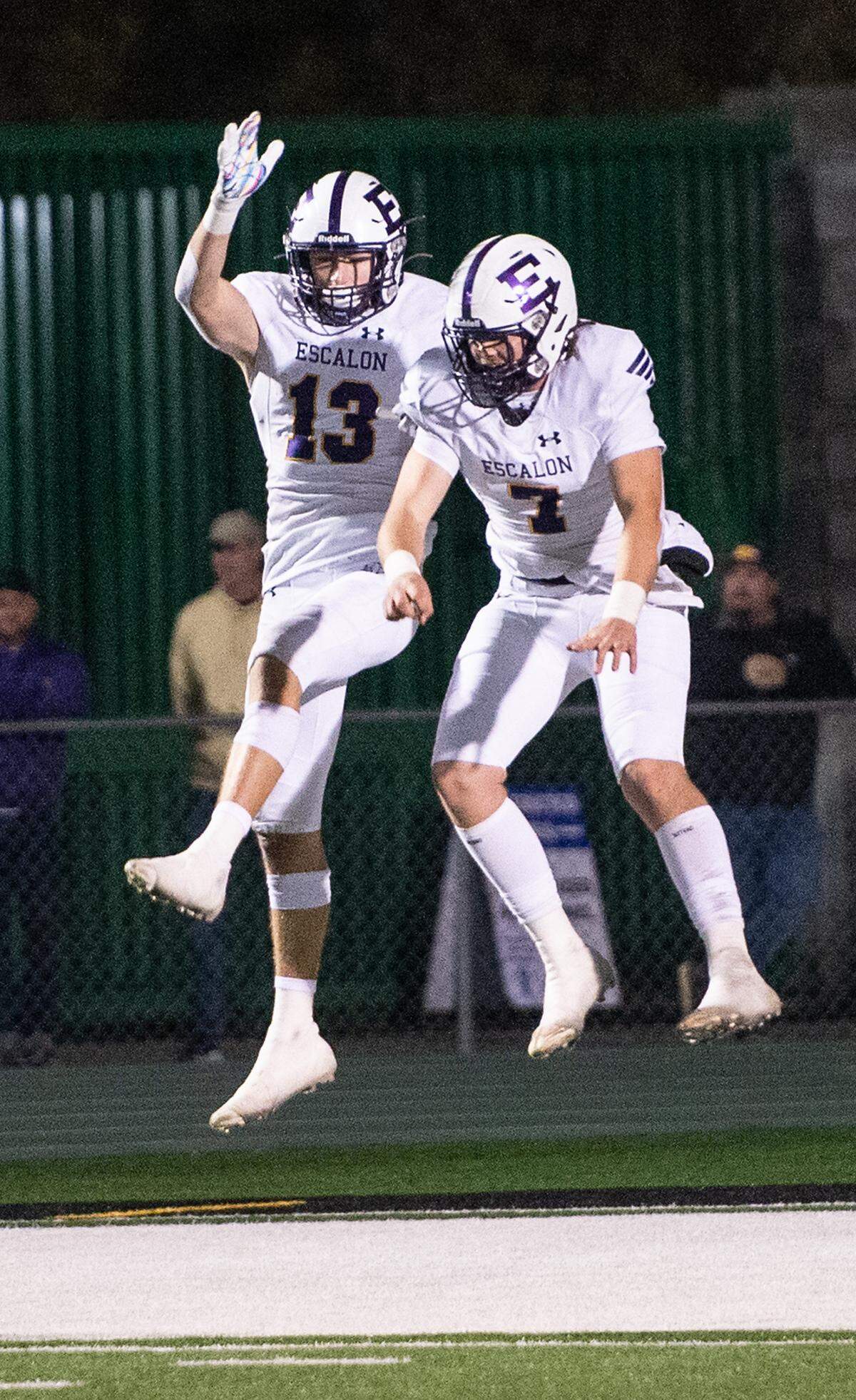 Escalon’s Owen Nash (13) and Donovan Rozevink (7) celebrate a touchdown during the Sac-Joaquin Section Division V championship game with Sonora at St. Mary’s High School in Stockton, Calif., Saturday, Nov. 26, 2022.