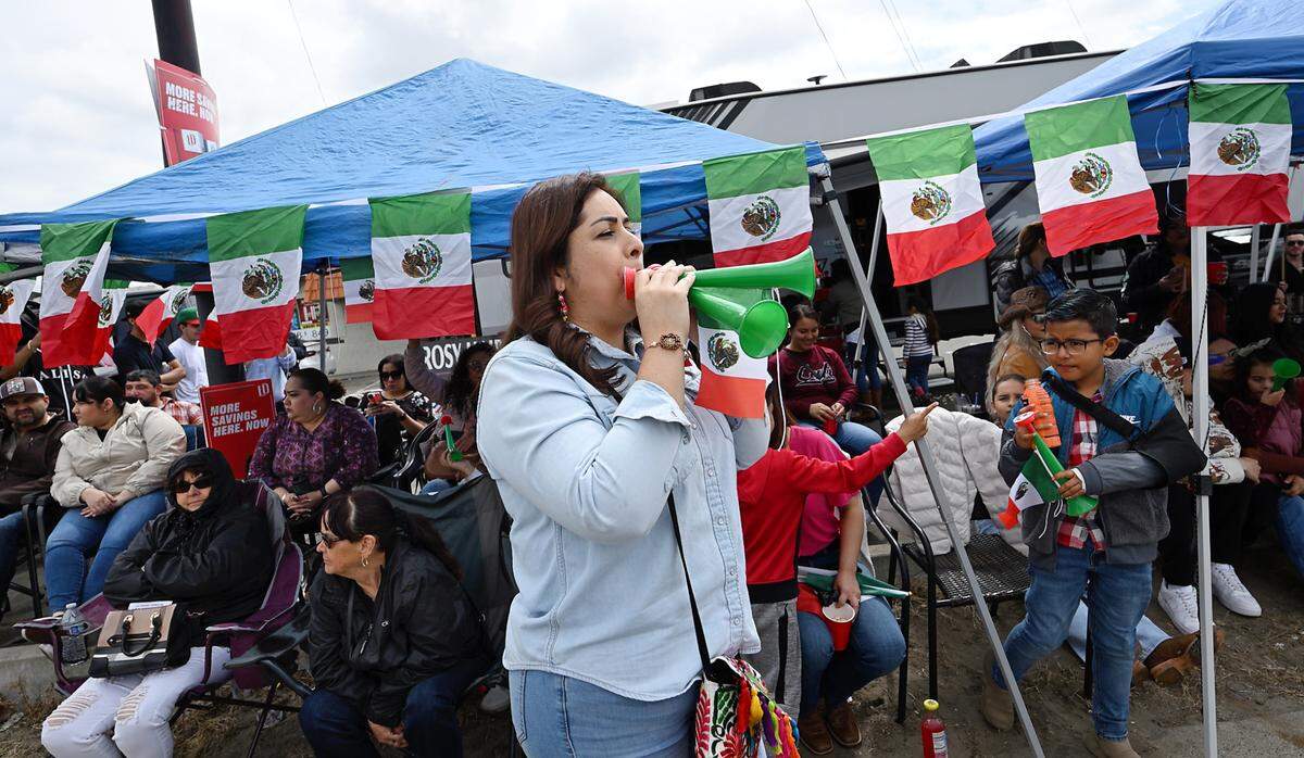 Sonia Cervantes creates some noise during the Cinco de Mayo parade on Crows Landing Road in Modesto, Calif., Saturday, May 6, 2023.