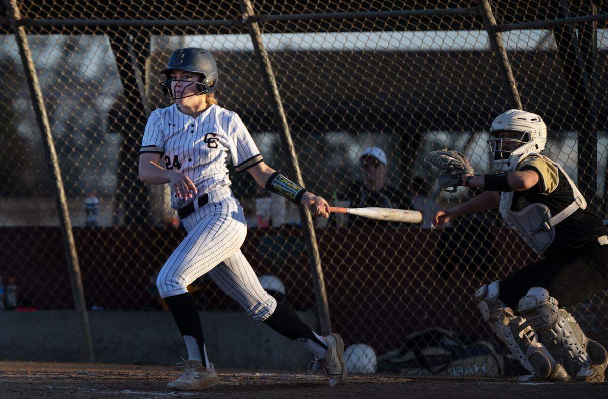 Central Catholic’s Emori Machado hits a liner down the third base line and scored on a walk-off during the game with Enochs at Rainbow Fields in Modesto, Calif., Tuesday, March 5, 2024.