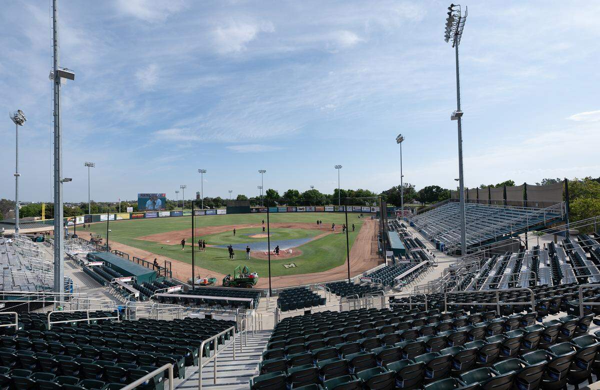 Fresno Grizzlies take fielding practice before the game with the Modesto Nuts at John Thurman Field in Modesto, Calif., Thursday, June 22, 2023. Fresno won the game 4-3.