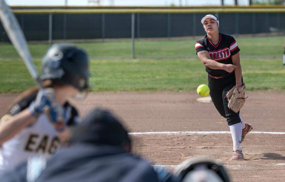 Modesto pitcher Aaliyah Williams throws to the plate during the Central California Athletic League game with Enochs in Modesto, Calif., Tuesday, April 18, 2023.