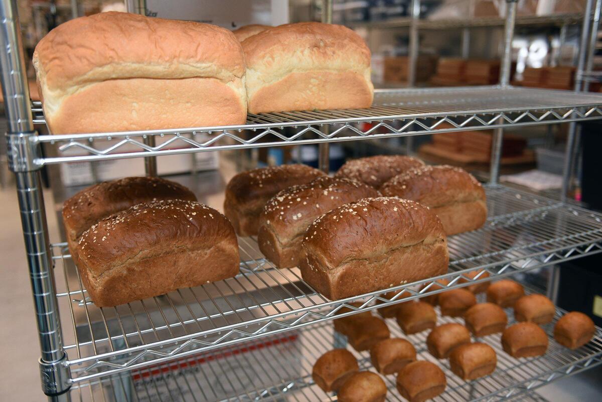 Fresh baked bread cools on racks Thursday September 19, 2019 at Apple Spice in Modesto, Calif. The new boxed lunch catering / delivery service has been open since last month.
