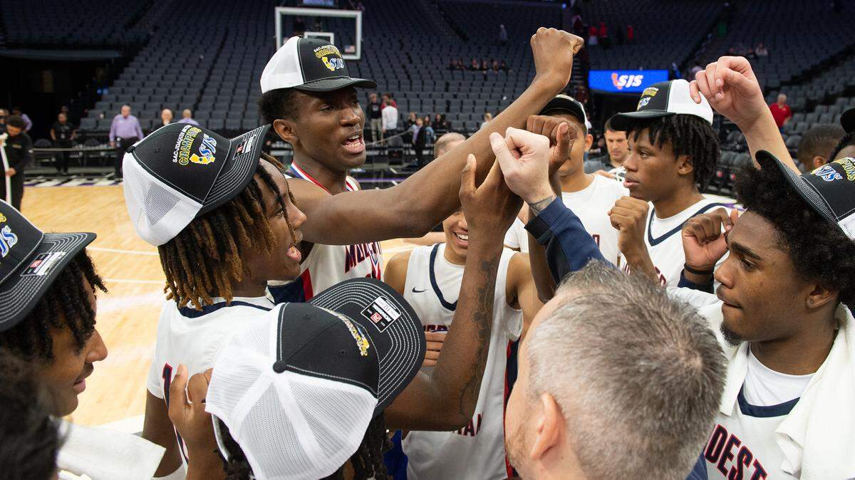 Modesto Christian players celebrate their victory over Jesuit during the Sac-Joaquin Section Division I championship game at Golden 1 Center in Sacramento, Calif., Saturday, Feb. 25, 2023. Modesto Christian won 79-53.