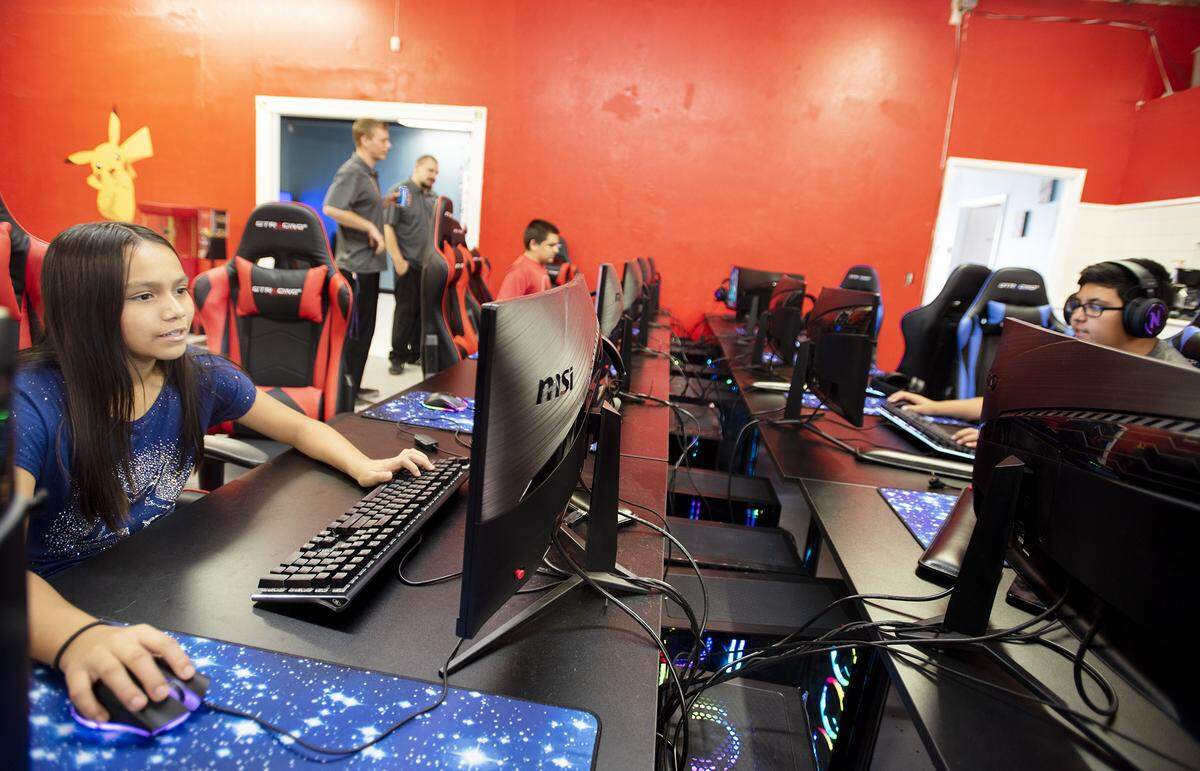 Lily Lopez, 10 plays a multi-player game at The Gaming Hub in Modesto, Calif., Wednesday, July 17, 2019.