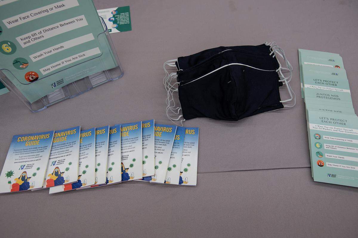Stanisilaus County Health Services Agency COVID-19 informational materials and face masks.