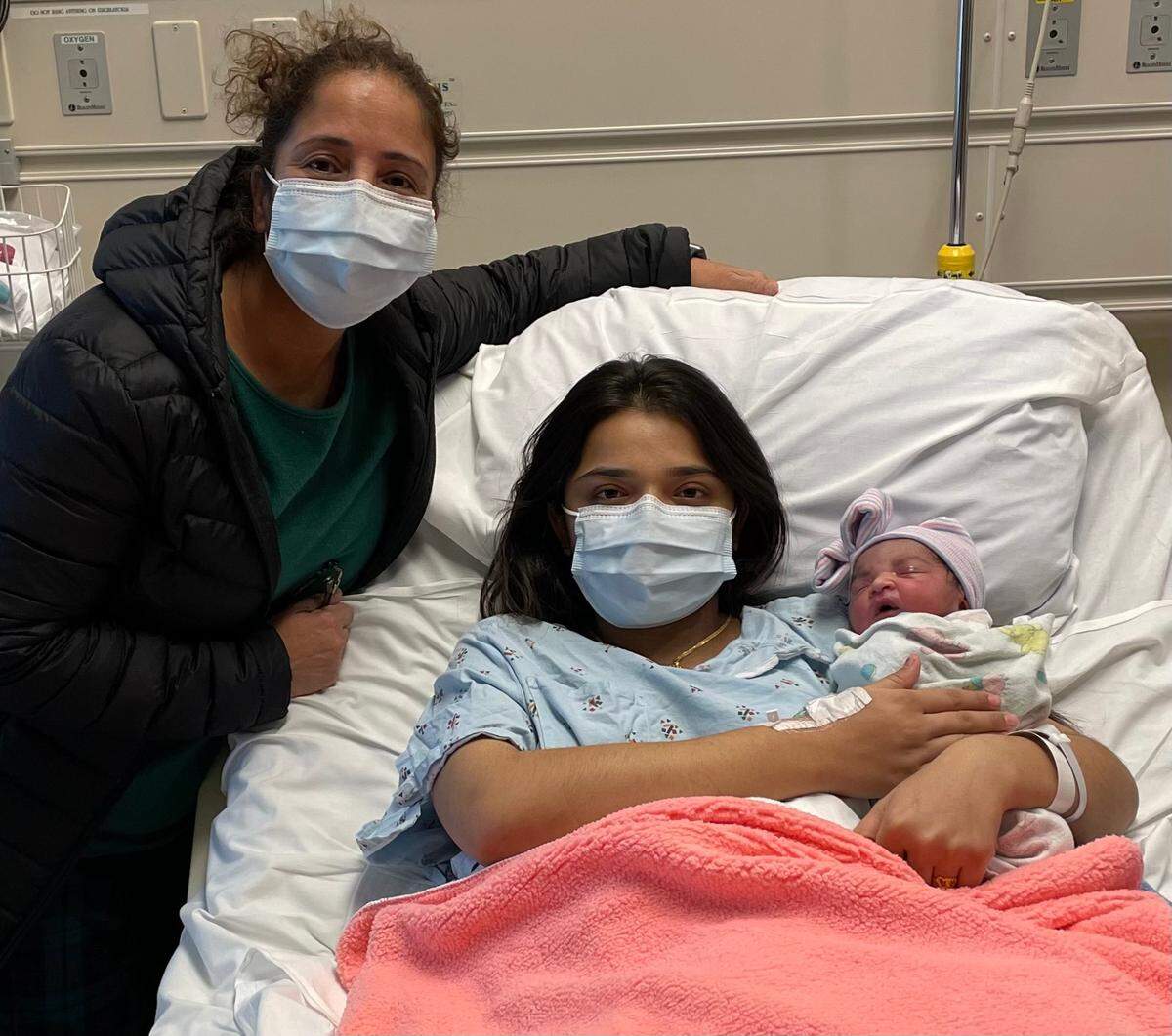 Ramandeep Kaur holds her daughter, Angel Kaur Mann, who was born at 6:02 a.m. Jan. 1, 2022 at Kaiser Modesto Medical Center. With them is Kaur’s sister, Sukhie Kaur, who is a nurse educator at Kaiser.