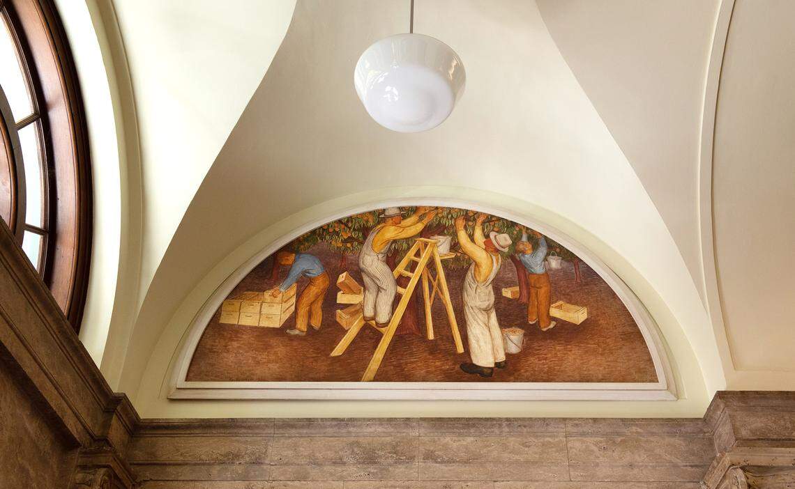 “Fruit Picking” by Ray Boynton was returned to the El Viejo Building, the former downtown Post Office, in Modesto, Calif., on Thursday, July 28, 2022.