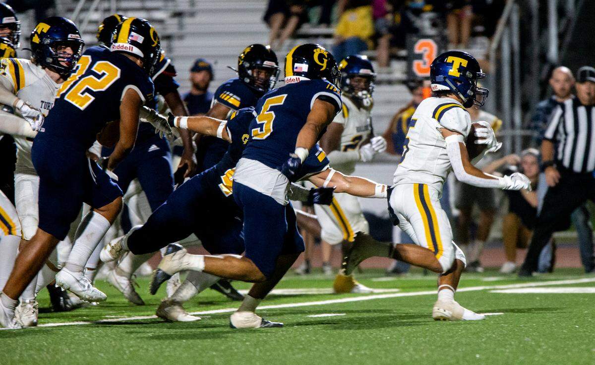 Jeremiah Bertalotto, 5 of Turlock High working his way up field Thursday Sept. 28, 2023 night as Gregori follows.