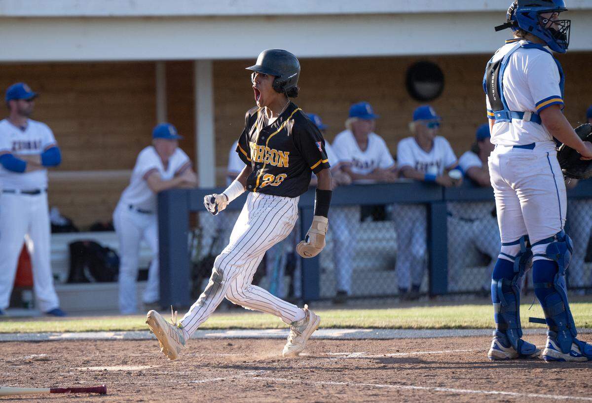 Hughson’s Isaac Lupercio reacts as he crosses home plate during the Sac-Joaquin Section D-V championship game with Lincoln at Islander’s Field in Lathrop, Wednesday, May 21, 2025.