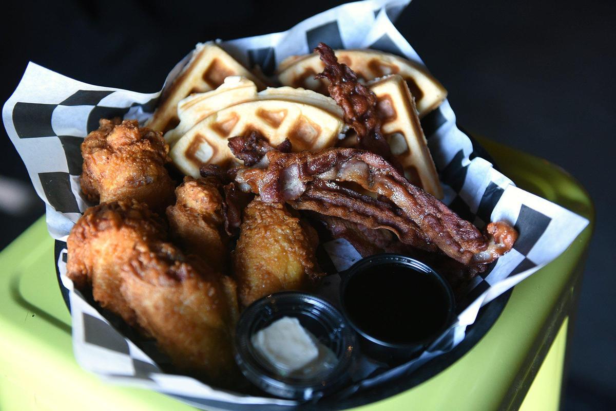 Chicken and waffles are pictured Thursday September 19, 2019 at Mystique Ultra Lounge, a restaurant and bar in Modesto, Calif. The club serves a full kitchen menu until midnight.