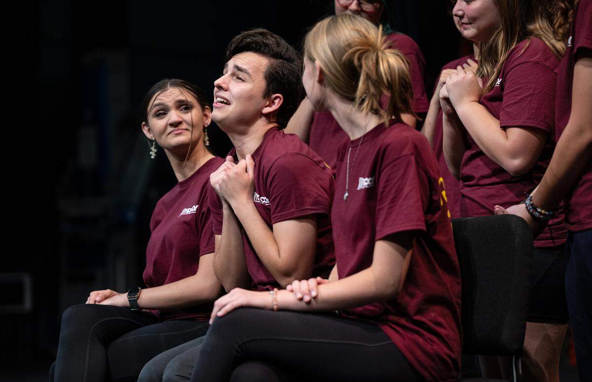 Daniel Hudson as Uncle Fester, second left, performs with members of the YES Company during a rehearsal for the production of “The Addams Family — School Edition” at the Gallo Center for the Arts in Modesto, Calif., Wednesday, July 5, 2023.