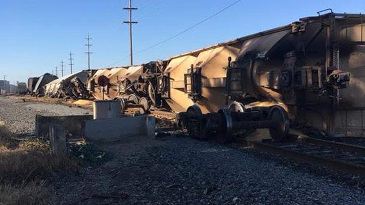 Three freight train cars tipped over on Service Road near Ceres, CA, on Wednesday, Aug. 2, 2018. No injuries were reported.