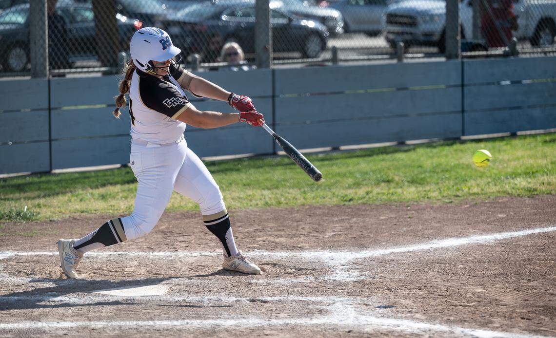 Enochs’ Natalie Camarena strikes a base hit during the Central California Athletic League game with Modesto in Modesto, Calif., Tuesday, April 18, 2023.