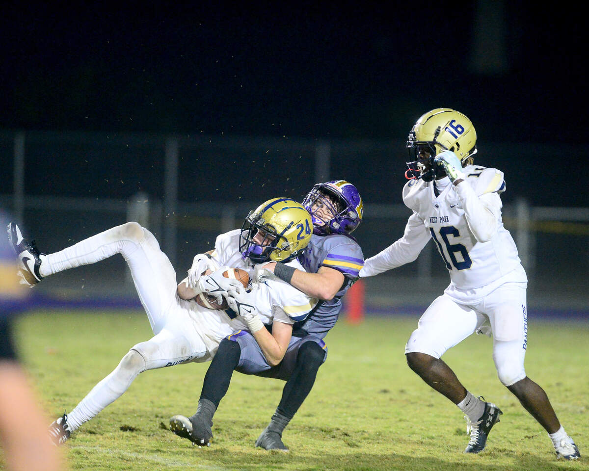 West Park’s Madix Ryan-Newman (24) intercepts a pass during a CIF San Joaquin Section Division IV semifinal against Escalon at Escalon High School on Friday. Escalon won 48-28.