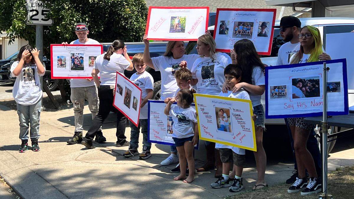 Relatives and friends gather on Entrada Way in Modesto for a news conference on the officer-involved fatal shooting of Paul Chavez Jr. on July 14.