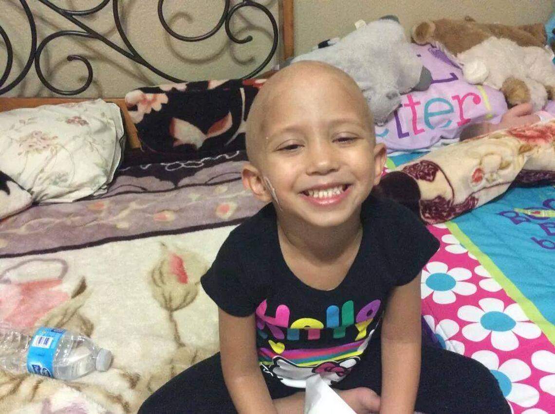 Zoya Hafiz is pictured in October 2014, just months after being diagnosed with neuroblastoma and beginning treatment.