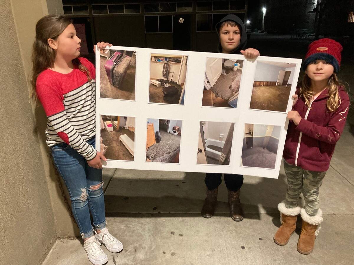 On Feb. 14, 2023, students of Hughson Christian School present photos of the damages caused by city sewer mishap in December 2022 that displaced the pastor and his wife. Left to right: Kaylee Crain, Sam and Kiley Cruz.