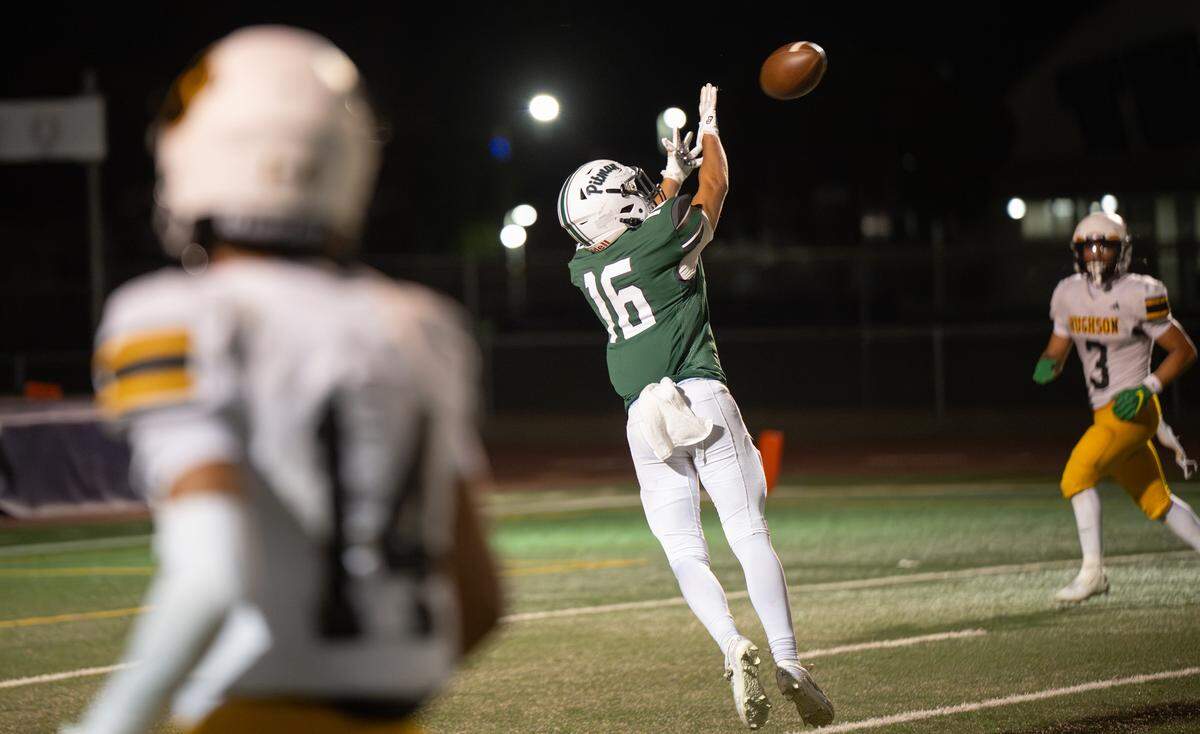 Pitman’s Caleb Grossman makes a touchdown catch during the game with Hughson at Turlock High School in Turlock, Friday, Sept. 5, 2025.