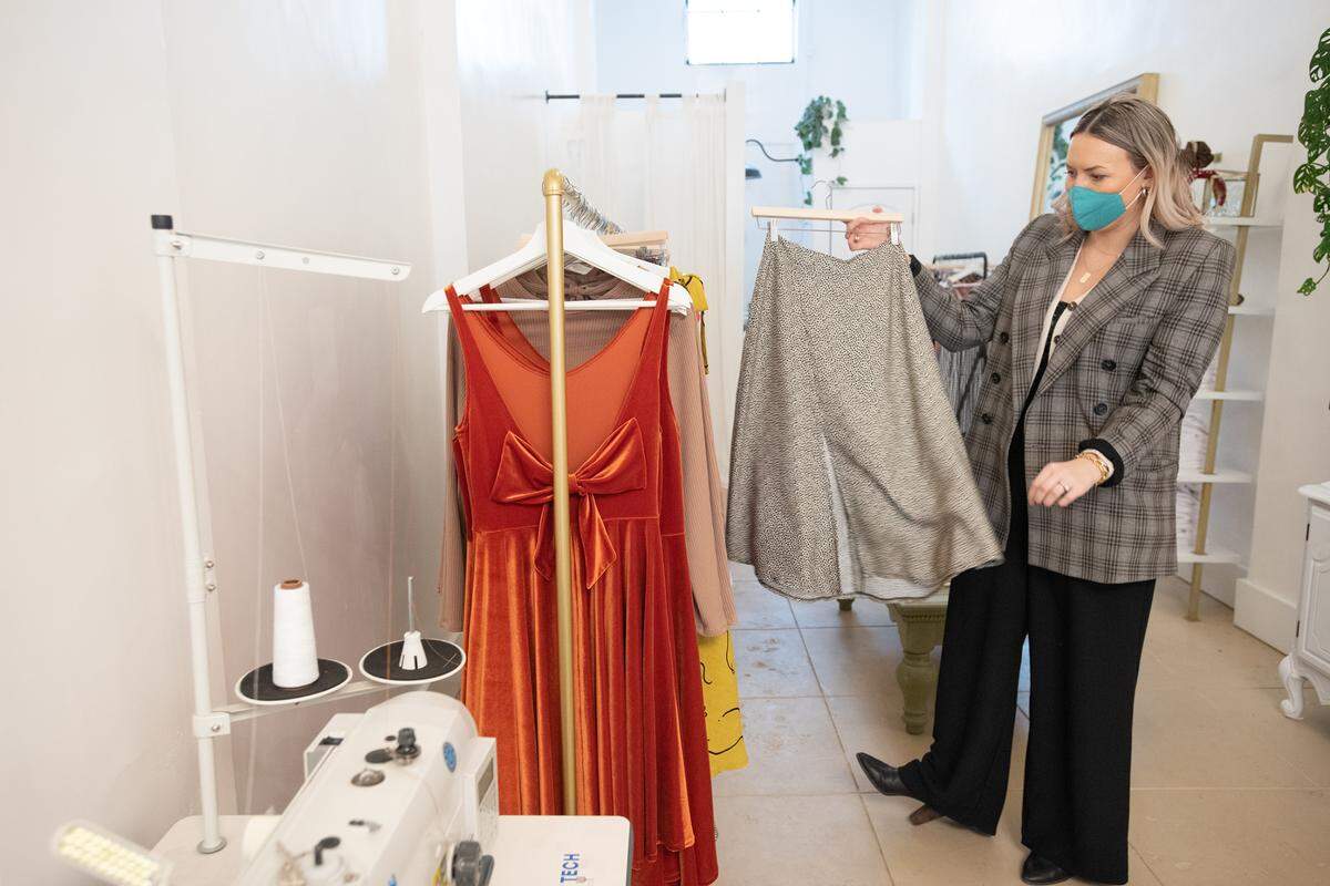 Designer Stephanie Oyervides at her clothing boutique The Taste Studio on J Street in Modesto, Calif., on Wednesday, Dec. 29, 2021. The Modesto-based clothing designer offers ready to wear & custom made dresses & more.