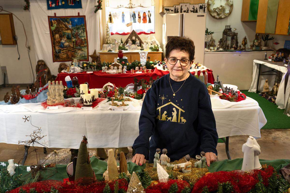 Toni Conway with some her nativity sets from her collection of 950 nativities at her home in Modesto, Wednesday, Dec. 4, 2024. Conway has nativity sets in every room of the house, and is hosting an open house for the public this season.