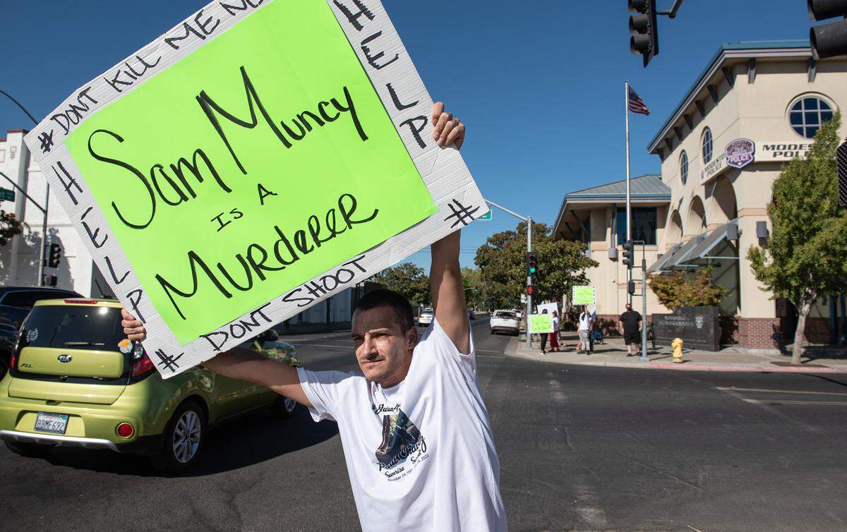 Eric Hager protests the shooting of Paul Chavez Jr. outside the Modesto Police Department in Modesto, Calif., on August 23, 2022.