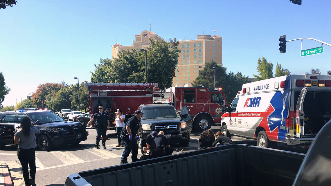 Two people injured after being hit by vehicle in downtown Modesto