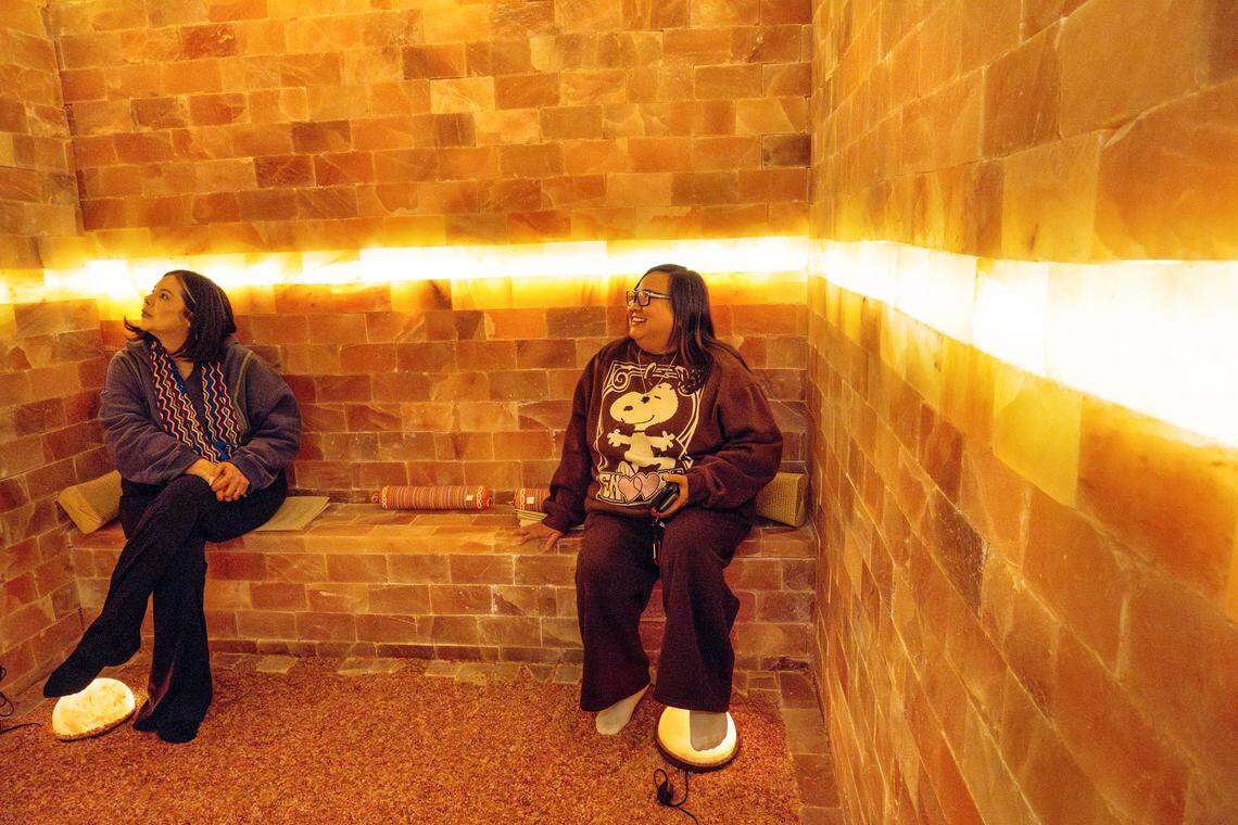 Bee reporter Maria Figueroa and Marife Ronquillo sit in the Himalayan salt room at K Glow Day Spa in Modesto, Tuesday, Feb. 25, 2026.