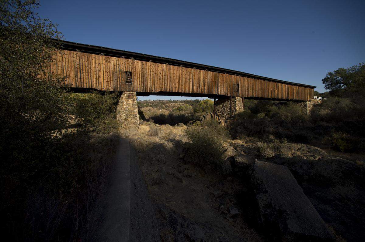 At 330 feet the Knights Ferry covered bridge spanning the Stanislaus River at the Knights Ferry Recreation area is the longest covered bridge west of the Mississippi River. The Stanislaus River Parks are overseen by the U.S. Corps of Engineers.