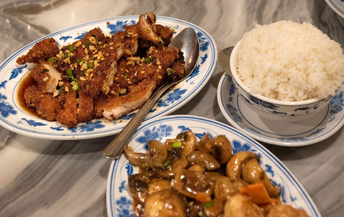 Garlic chicken and mushroom prawns at Beijing Restaurant in Modesto, Calif., Thursday, Dec. 15, 2022.