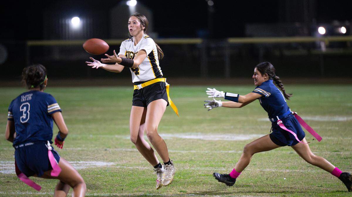 Hughson’s Leah Hobby intercepts a pass during the Sac-Joaquin Section Division IV playoff game at Central Catholic High School in Modesto on Wednesday, Oct. 29, 2025. Hughson won the game 13-12.