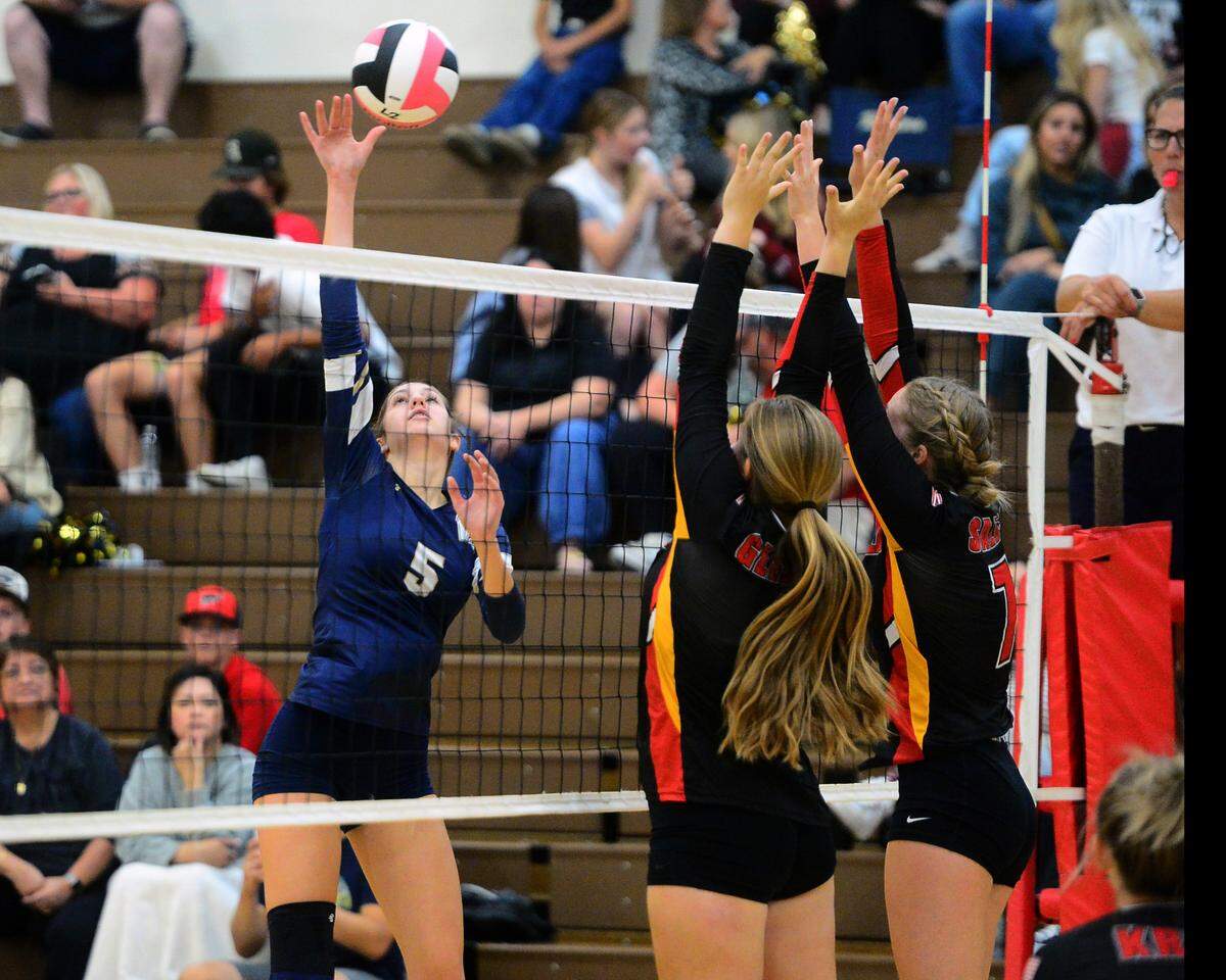 Central Catholic’s Alyssa Thomas (5) spikes the ball during a game between Oakdale and Central Catholic at Oakdale High School in Oakdale, Calif. on Thursday, Oct. 17, 2024. 