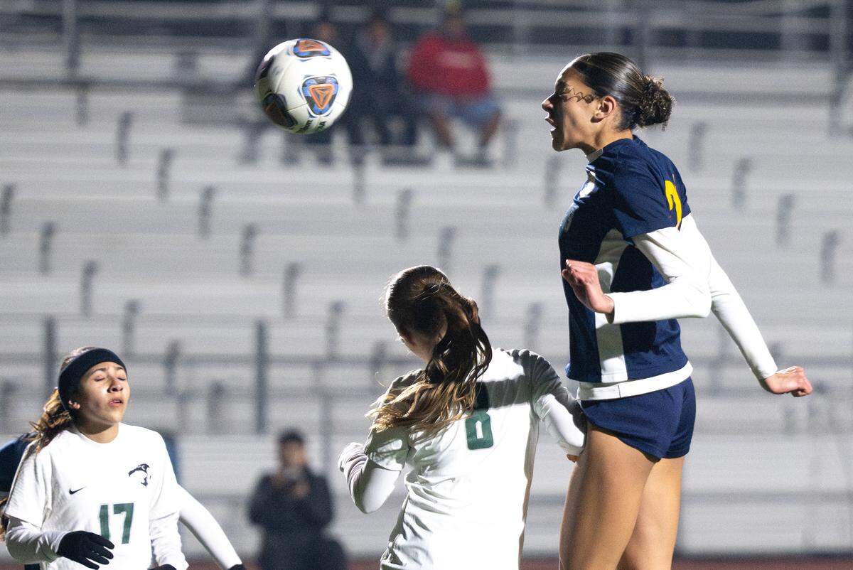 Gregori’s Kylie Farmer heads the ball on a shot at goal during the Central California Athletic League game with Pitman at Gregori High School in Modesto on Tuesday, Jan. 13, 2026. 
