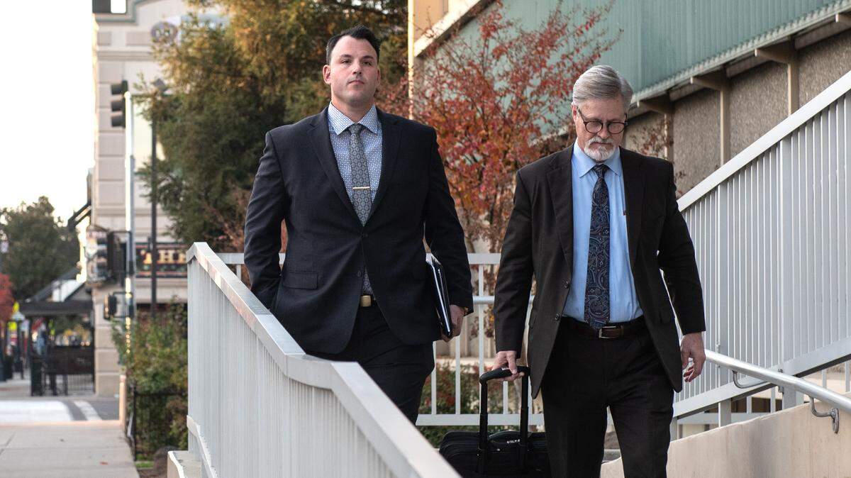 Joseph Lamantia leaves the Stanislaus County Superior Court with his lawyer Roger Wilson in Modesto, Calif., Tuesday, Nov. 22, 2022. Lamantia, a former Modesto Police officer, shot and killed Trevor Seever in 2020. A hearing is being held before Judge Carrie Stephens to determine whether there is enough evidence for Lamantia to stand trial.