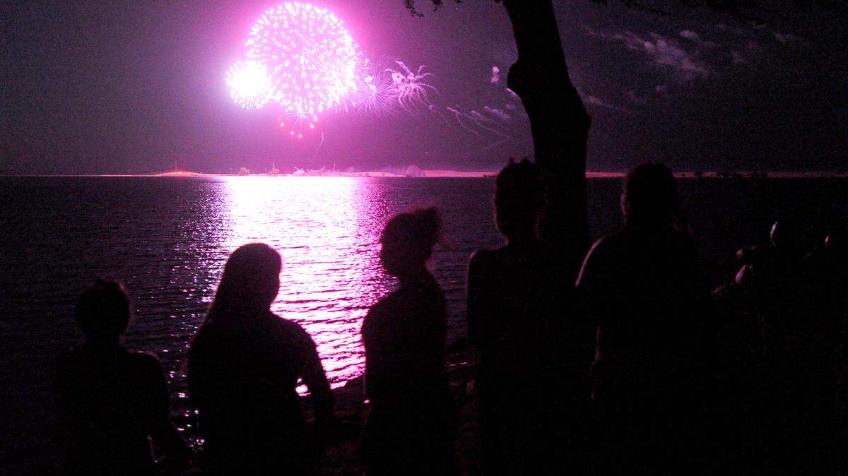 Families and friends gathered on the shores of Woodward Reservoir just outside of Oakdale for a past year's Fourth of July fireworks show.