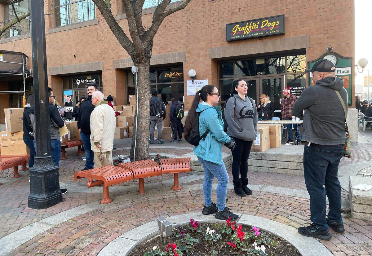 Volunteers gather for Stanislaus County’s point in time count of the homeless population in Modesto, Calif., Thursday, Jan. 26, 2023.
