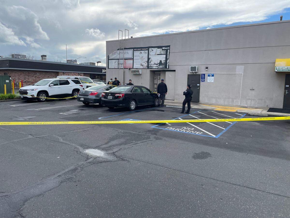 Police crime scene tape blocks access to Max Muscle on the 3200 block of Dale Road as Modesto Police Department investigates a shooting involving police and at least one suspect on Monday 17, 2025.