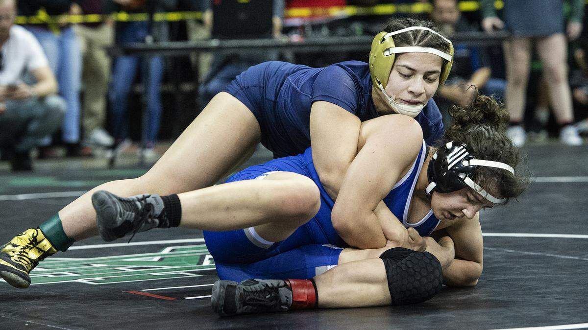 Faalia Martinez of Central Catholic wins the 137-pound championship match over Megan Stottsberry of Orland during the 2020 CIF Sac-Joaquin Section Masters Meet at Stockton Arena in Stockton, Calif., on Saturday, Feb. 22, 2020.