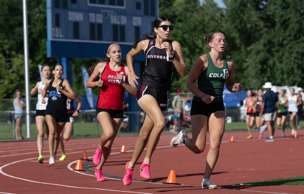 Riverbank runner Giselle Fernandez, middle, qualified for the state meet with a third place finish in the 1600 meter race at the CIF Sac-Joaquin Section Masters Track Meet at Davis High School in Davis, Calif., Saturday, May 18, 2024. Fernandez had a time of 5:03.19.
