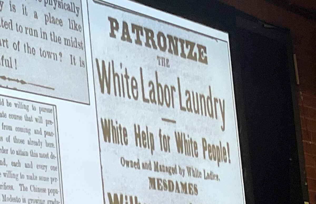 A newspaper from the 1880s carried a notice urging white residents not patronize Chinese laundries in Modesto, California. It was displayed at an Oct. 23, 2023 presentation at Modesto Junior College.