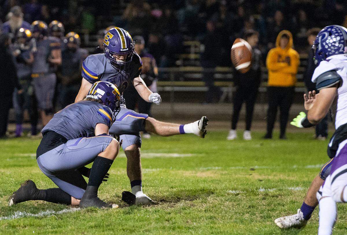 Escalon’s Talan Reider kicks an extra point during the first round playoff game with Pacheco in Escalon, Calif., Friday, Nov. 4, 2022.